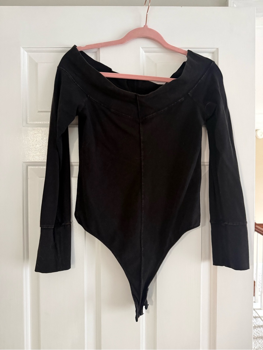Womans Black Long-Sleeve One-Piece Bodysuit